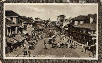 A vintage black and white postcard of the native quarters, Null Bazaar, Bombay